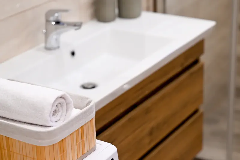 Folded towels on the bathroom vanity
