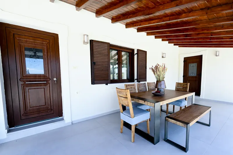 The dining table under the timber ceiling