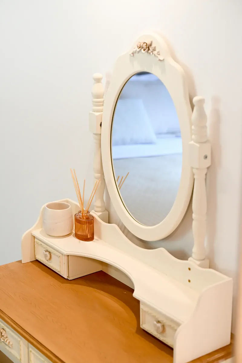 The dressing table mirror