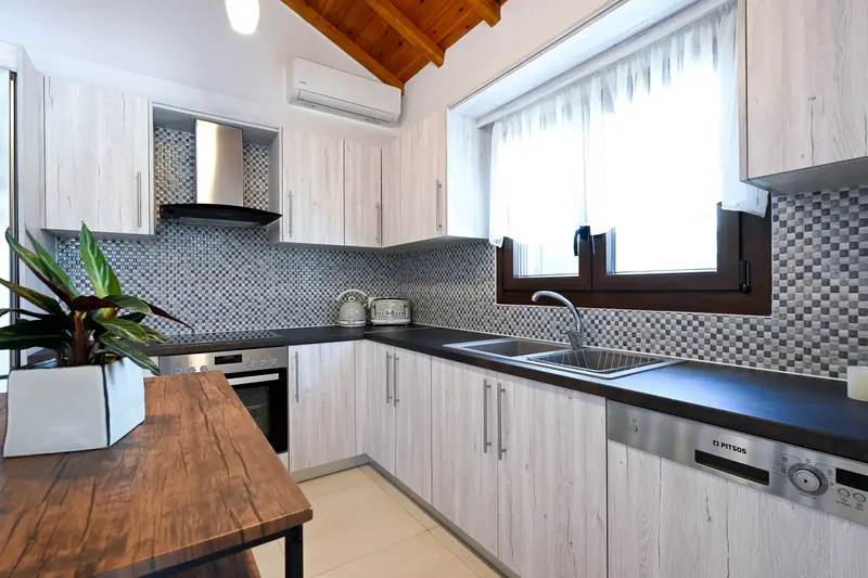 The kitchen counter and the window above it