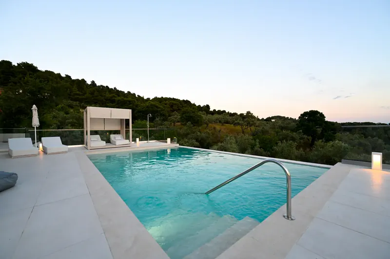 The pool in the morning, with the hills beyond